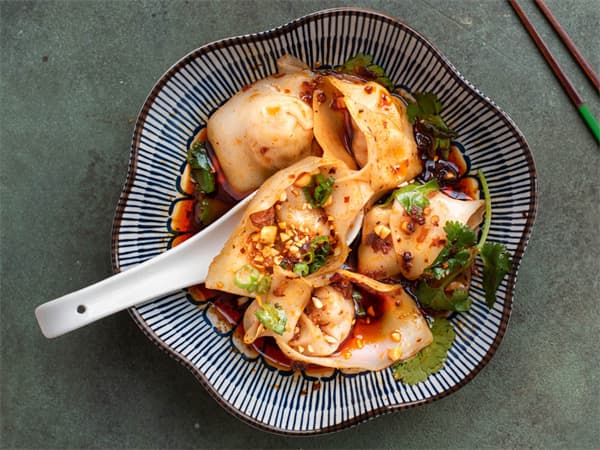 Spicy Wontons in Peanut Sauce